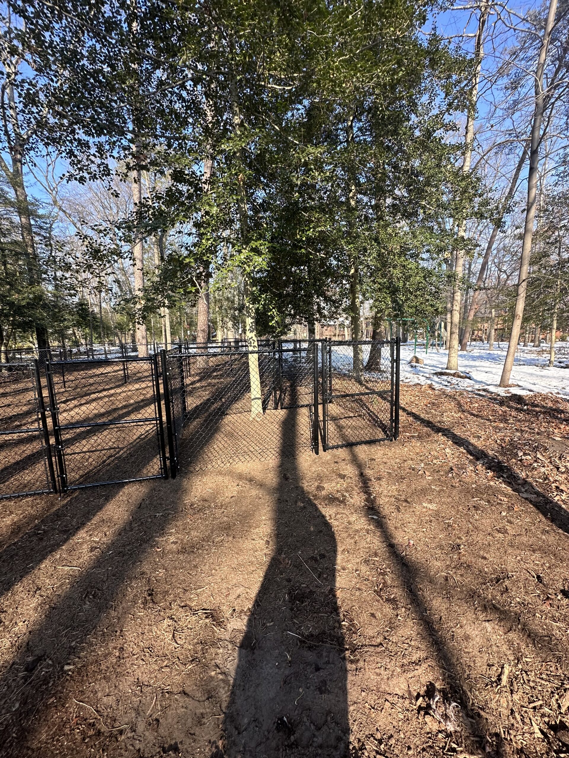 All Around Fence sign mounted on black chain link dog park fence in Pasadena MD
