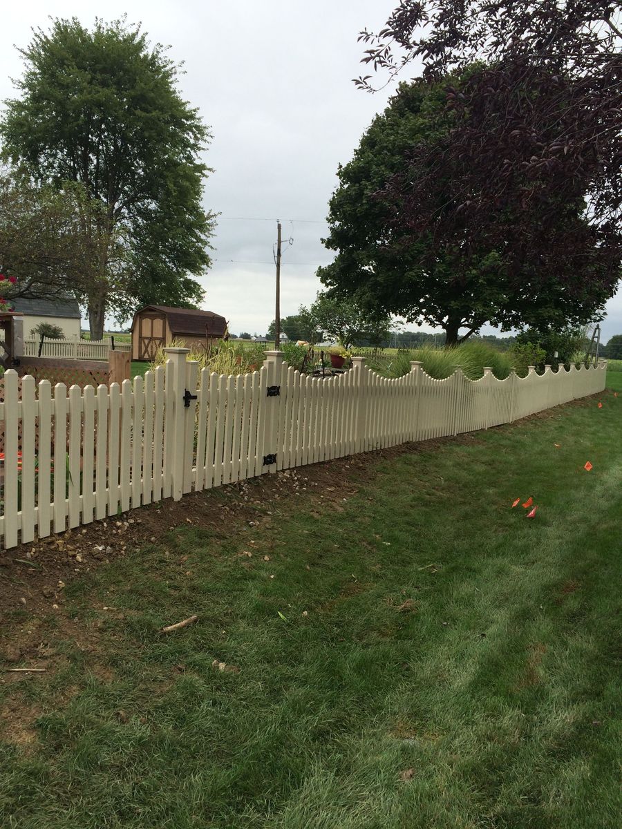 Tan vinyl fence installation in Fort Wayne, Indiana, completed by All Around Fence.