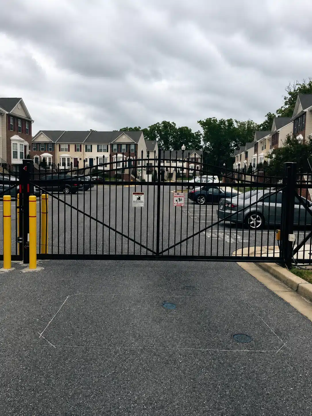 Automated residential community gate across a paved entrance in Severna Park.