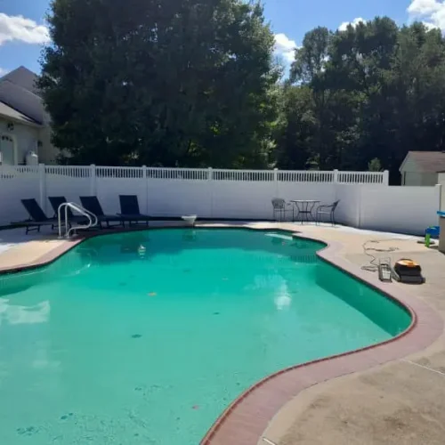 Pool fencing Maryland aluminum fence around residential pool for safety