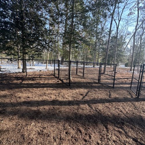chain link fencing creating multiple sections inside a Pasadena Maryland dog park