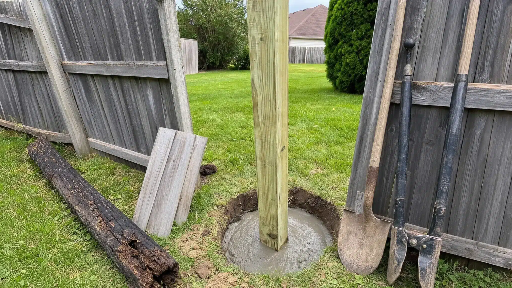 Rotted fence post replaced with a new pressure-treated post in Severna Park, MD.