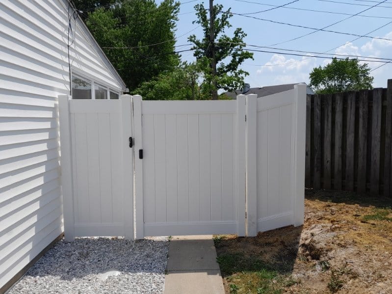 vinyl privacy fence surrounding a shed and yard area in Ferndale Maryland