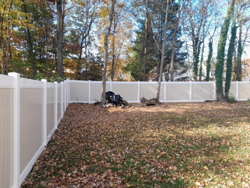 tall vinyl fence offering backyard privacy for a residence in Odenton Maryland