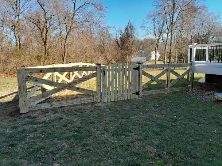 crossbuck wood fence and gate installed for a yard in Millersville Maryland