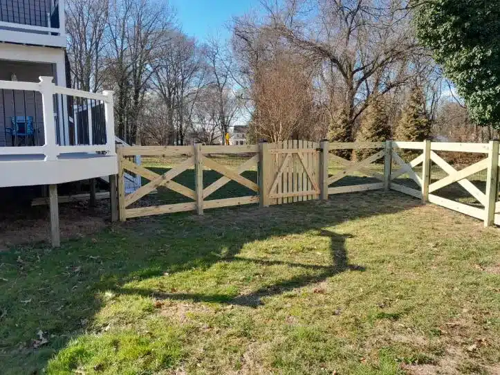 custom crossbuck wooden fence with walk-through gate in Millersville Maryland