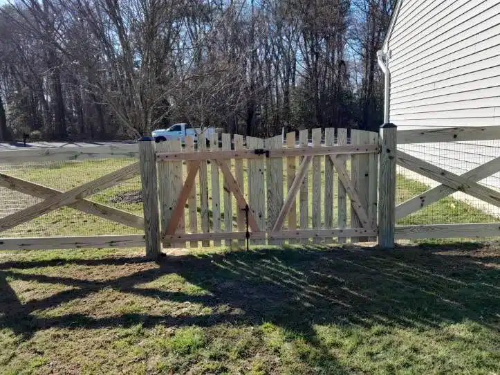 decorative crossbuck fence design installed for a residential yard in Millersville MD