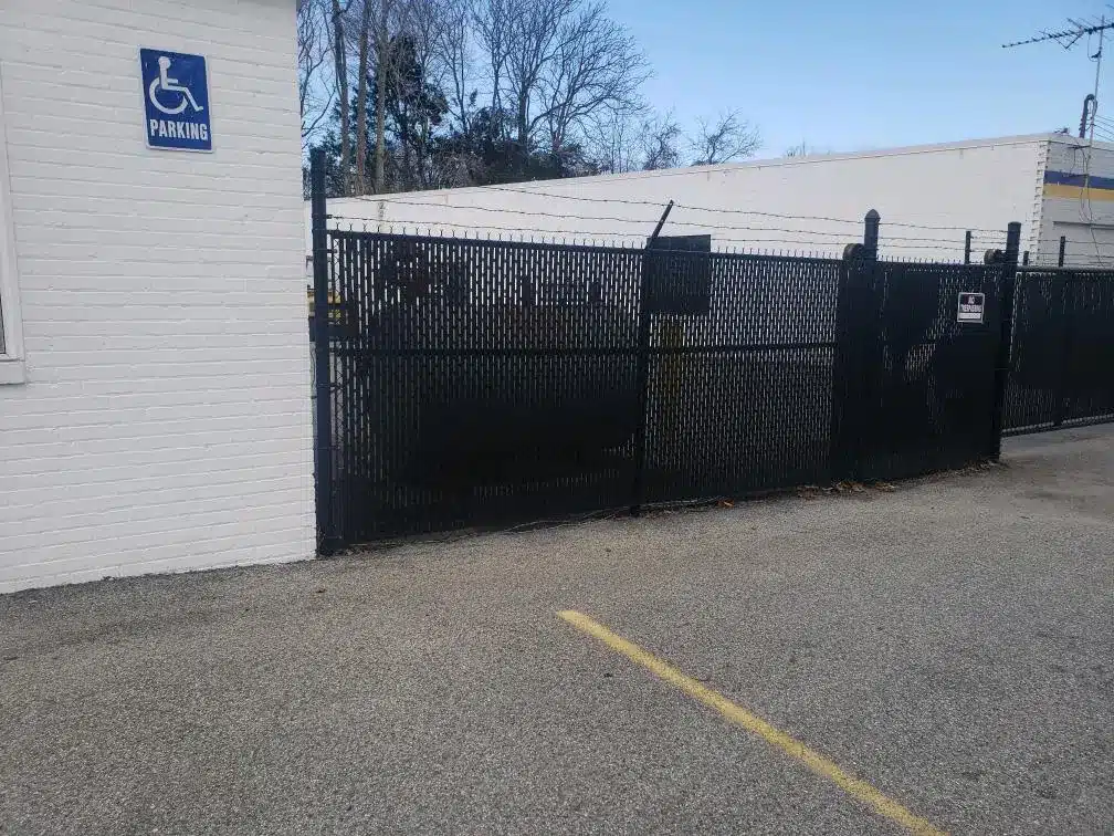 Black privacy chain link fence at commercial property
