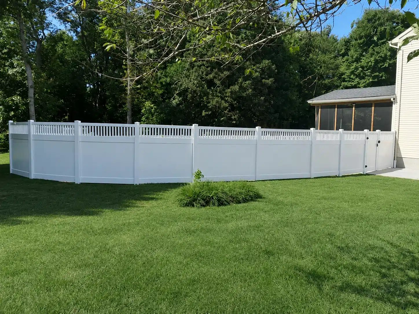 Semi-privacy vinyl fence with gate in a residential yard in Glen Burnie, MD.