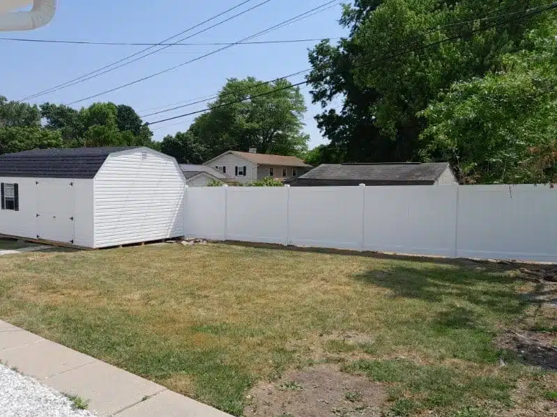 6-foot white vinyl privacy fence enclosing a backyard in Ferndale, MD