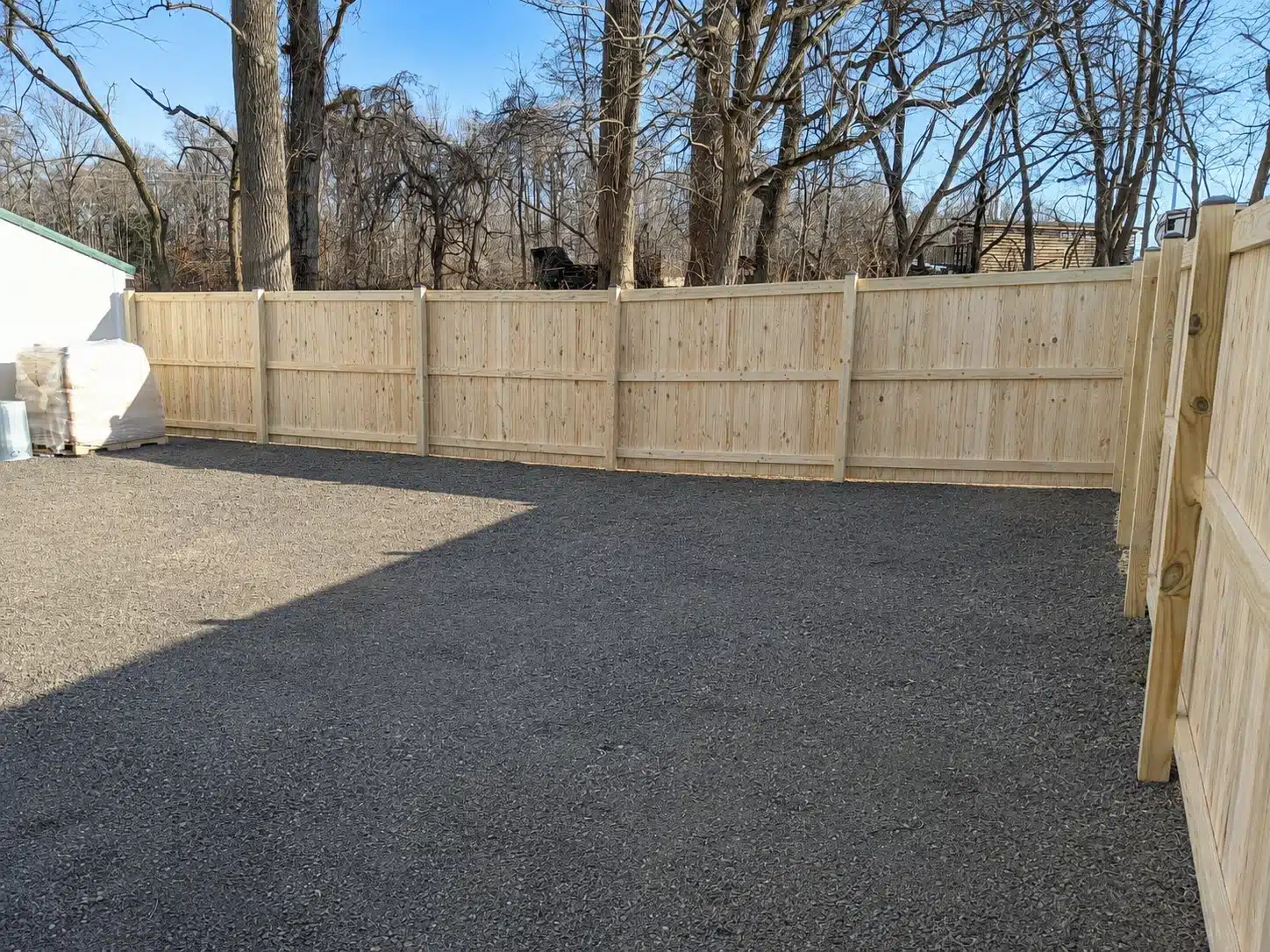 Shadowbox wood privacy fence installed along a residential side yard in Severna Park, MD.